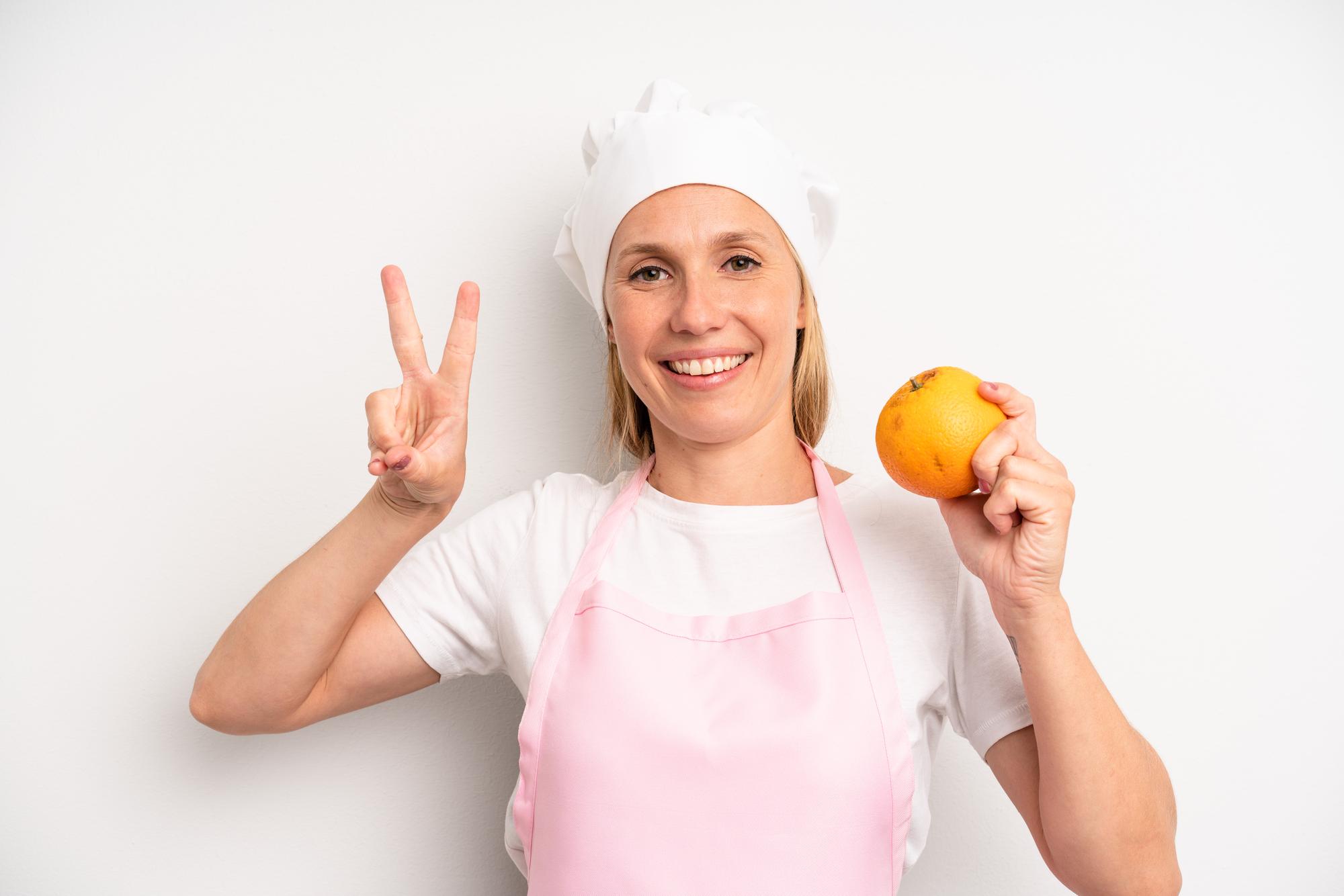 instructor smiling in kitchen studio